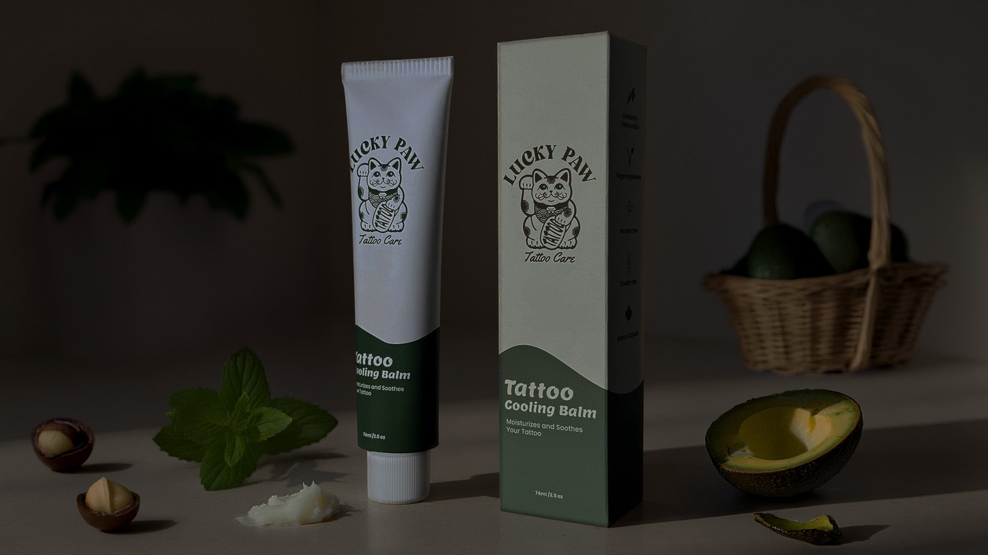 Lucky Paw Tattoo Cooling Balm with packaging on a dark background