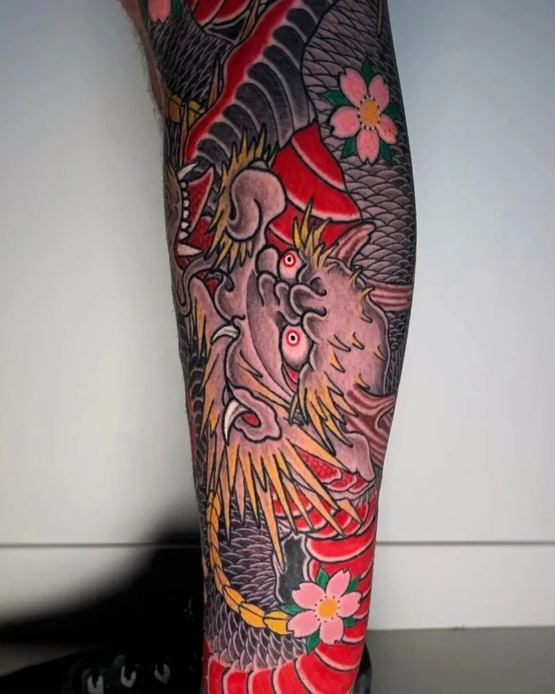 Healed dragon calf tattoo by our artists