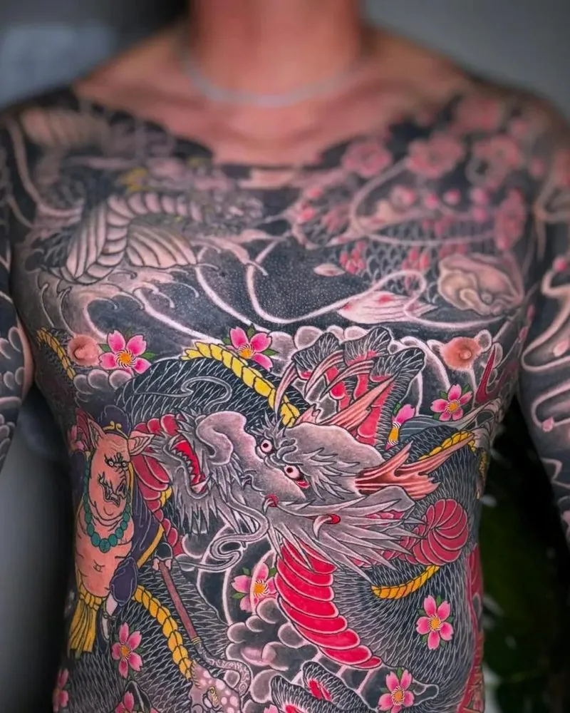 Healed dragon front torso tattoo by our artists
