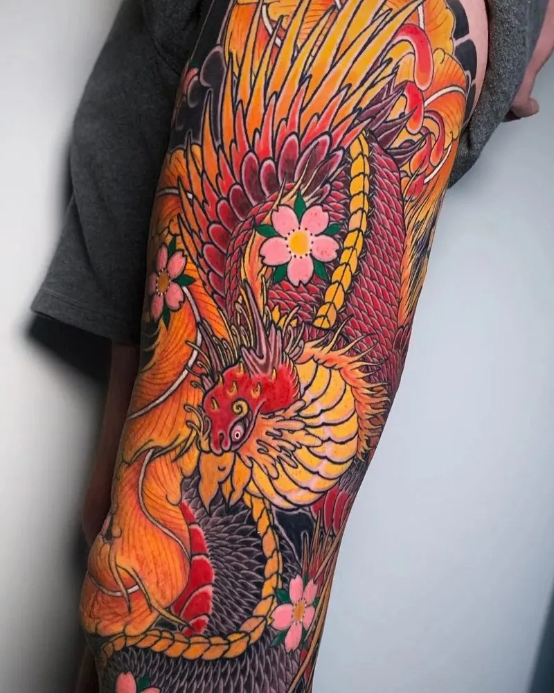 Healed phoenix thigh tattoo by our artists