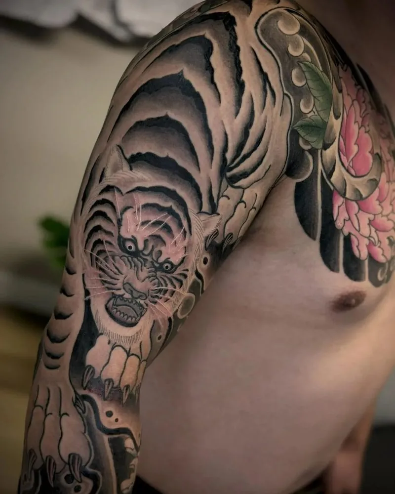 Healed tiger and peony sleeve tattoo by our artists