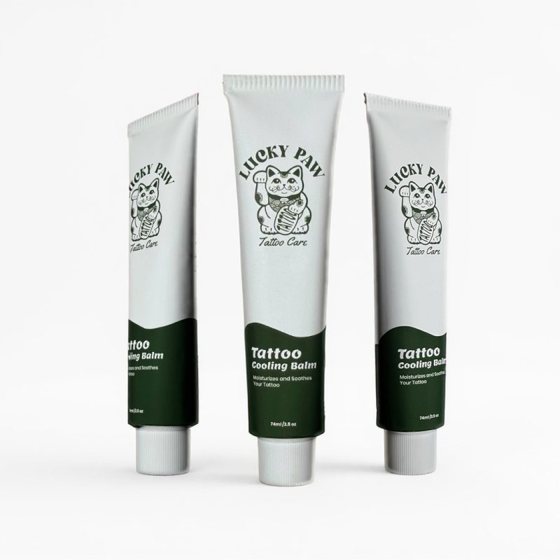 Three Lucky Paw Tattoo Cooling Balm tubes displayed on a clean white background